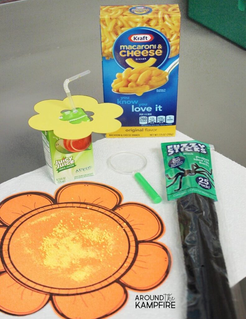 Pollination science activity student supplies-macaroni and cheese powder, juice box, and pipe cleaners.