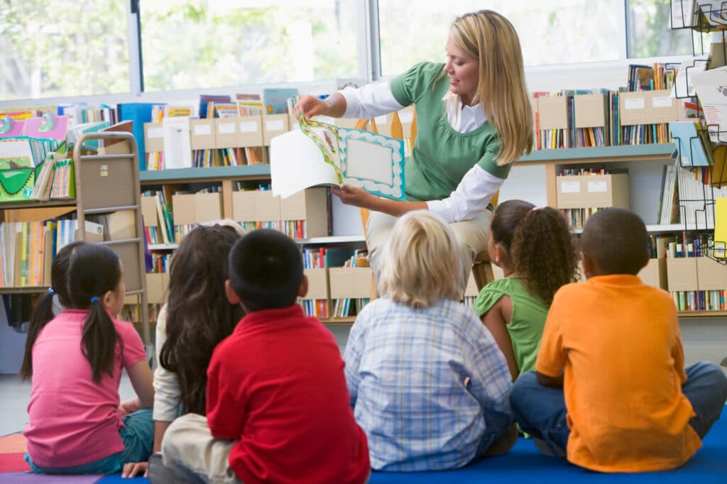 Teacher doing read aloud in Kindergarten classroom