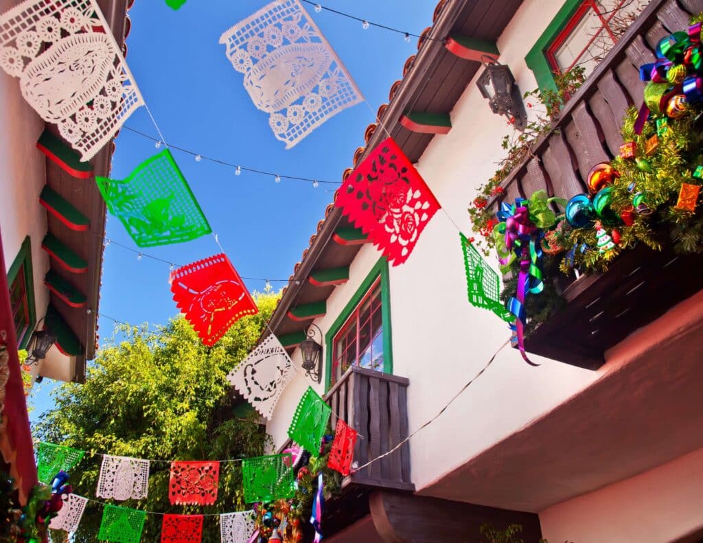 Papel Picado decorating streets at Christmas in Mexico.